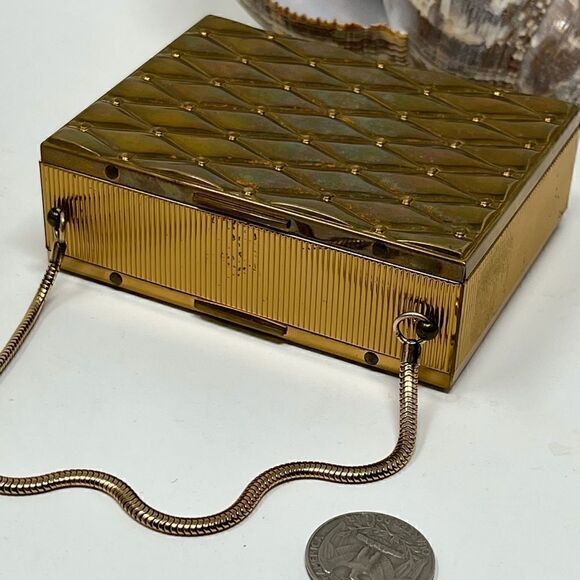 Vintage, gold tone compact/purse.  